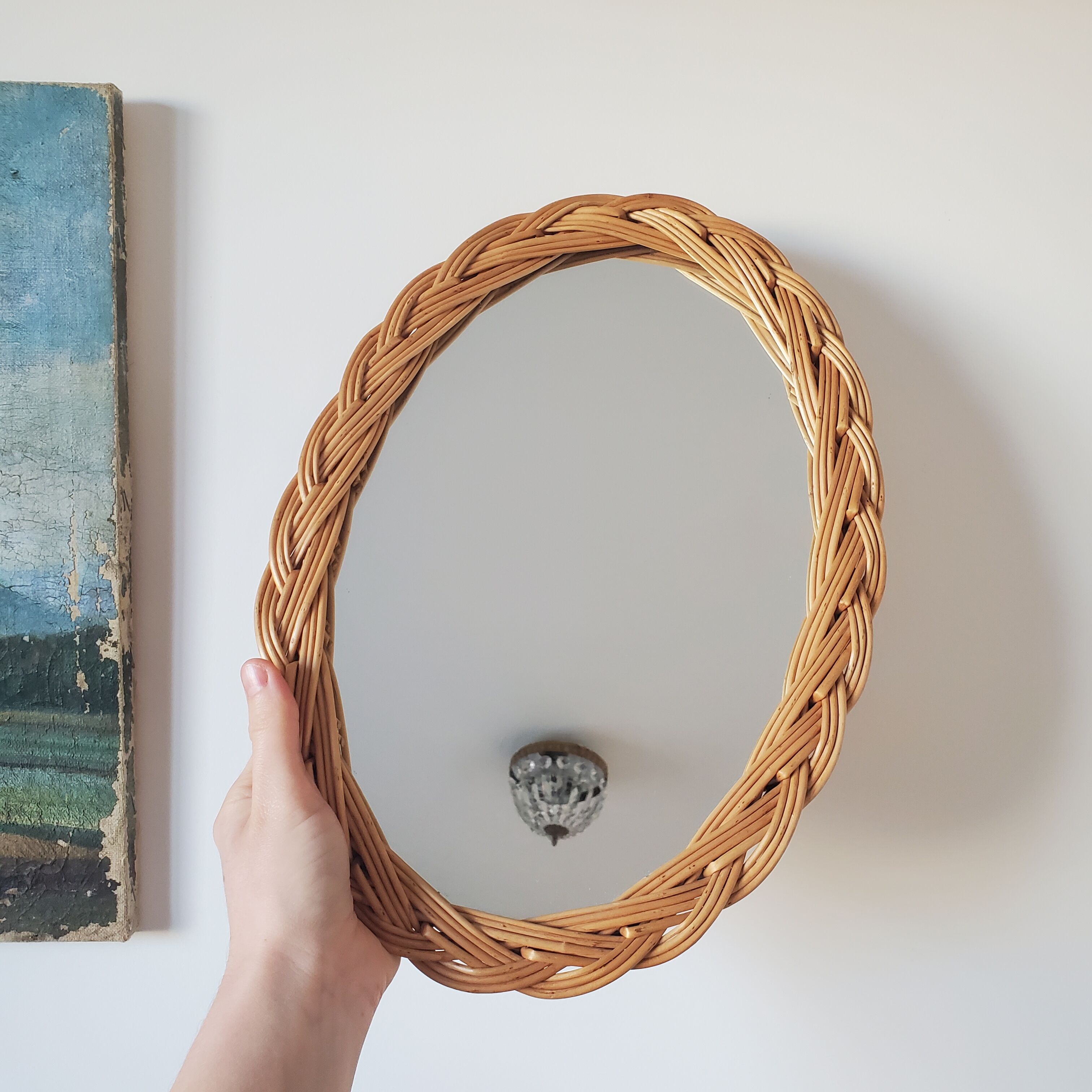 Oval mirror in braided wicker