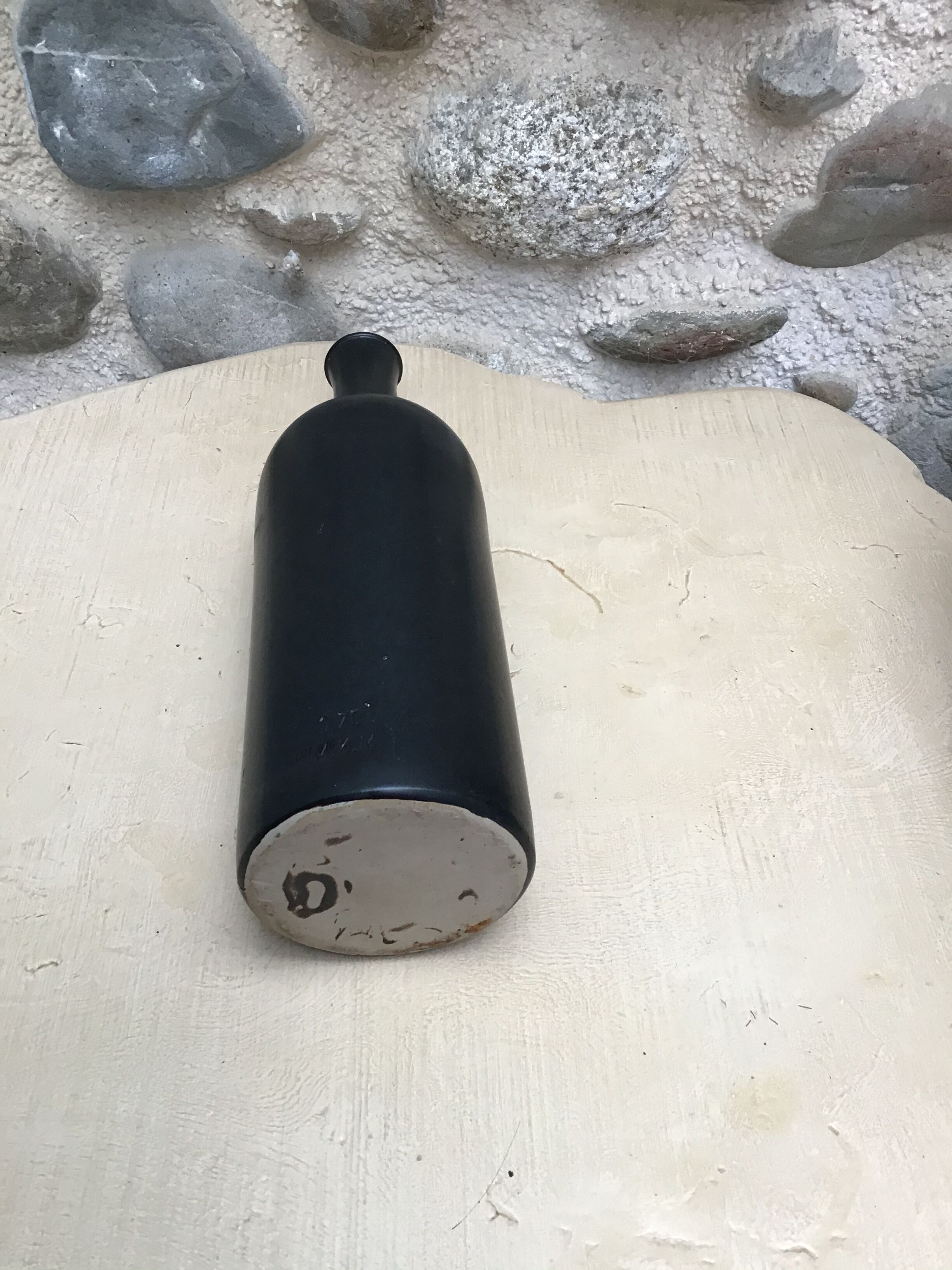 M.K. sandstone bottle.M.