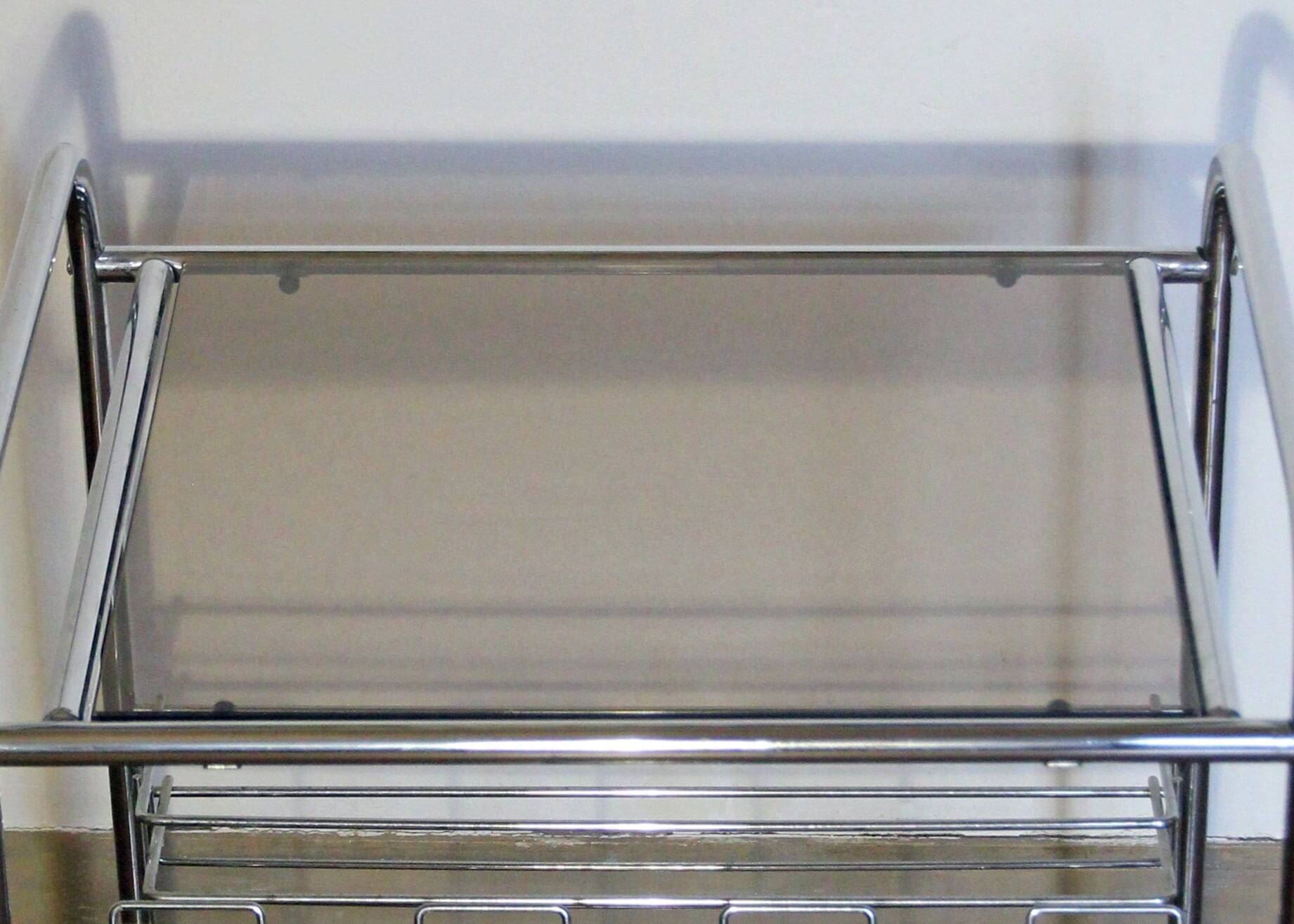 Stainless steel magazine holder side table