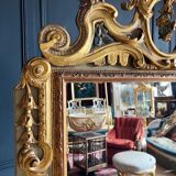 Italian mirror from the Napoleon III period in painted and gilded wood
