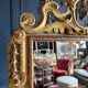 Italian mirror from the Napoleon III period in painted and gilded wood