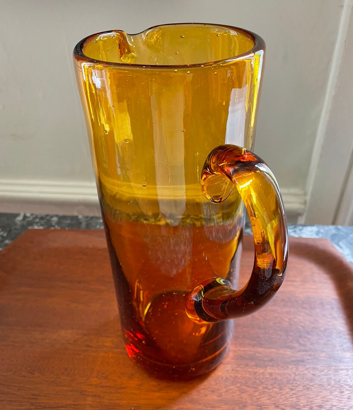 Amber pitcher bubbled glass