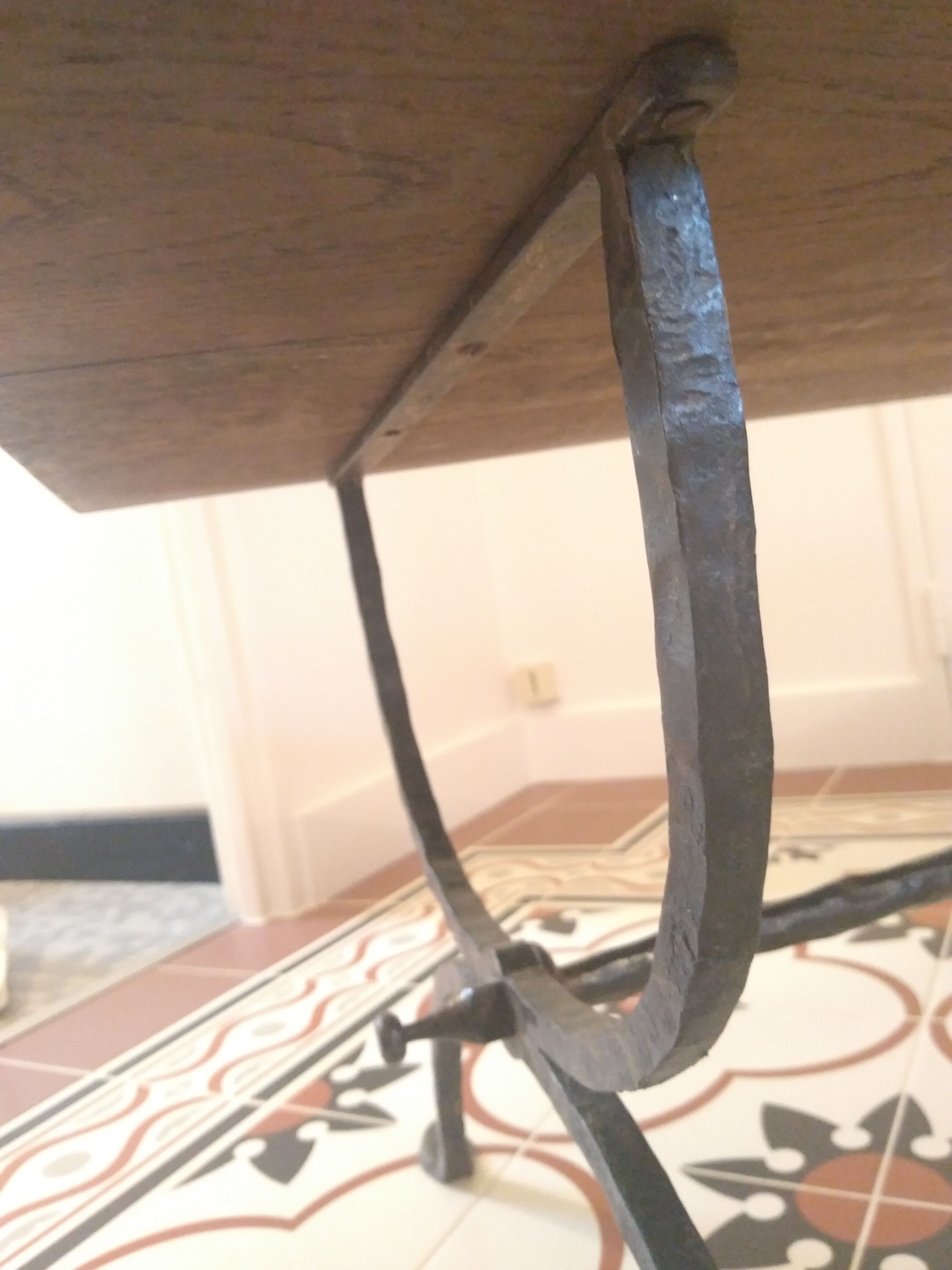 Coffee table, wooden top, wrought iron legs