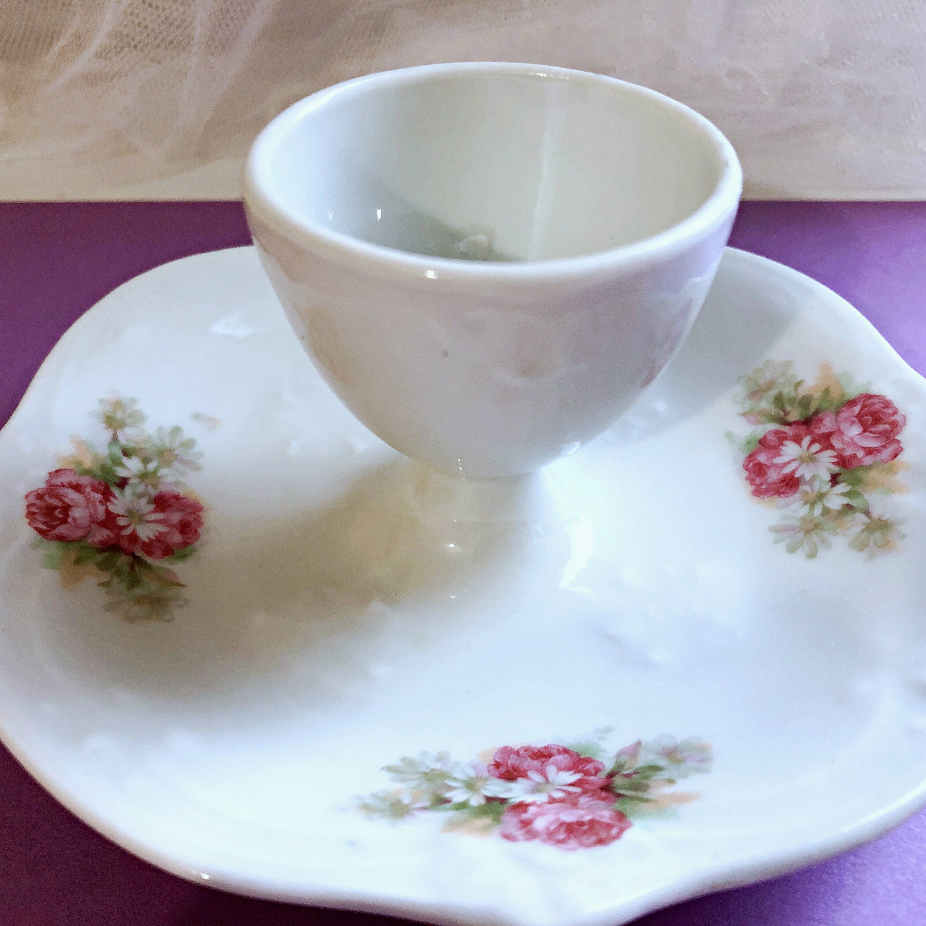 Porcelain egg cup with shabby chic style floral bouquet decoration Romanticism