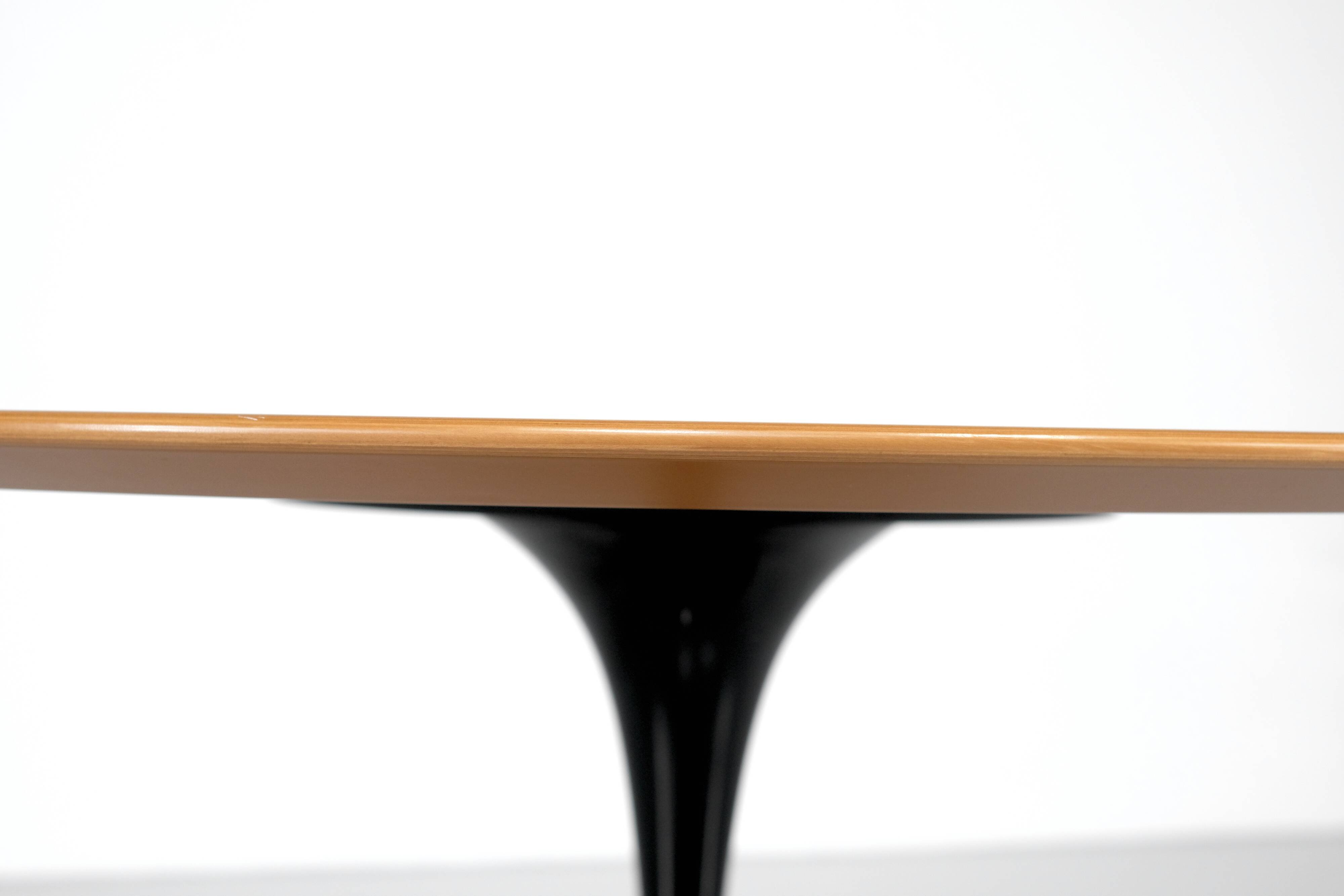Wooden "Tulip" table by Eero Saarinen for Knoll Studio, USA 1958.