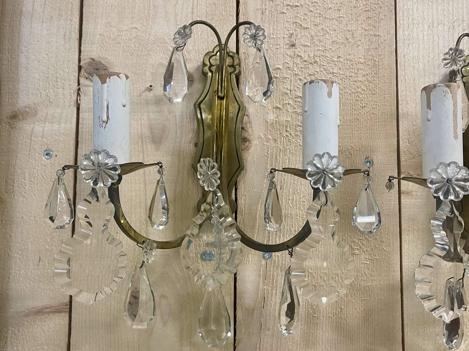 Pair of bronze sconces and pendants from the early 20th century