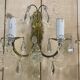 Pair of bronze sconces and pendants from the early 20th century