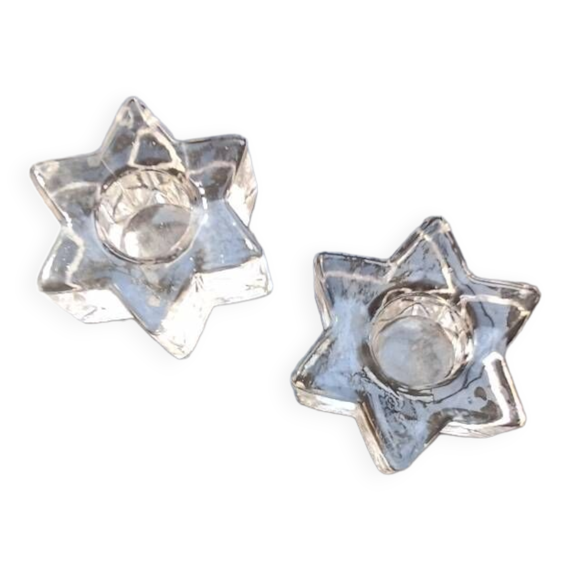 2 star-shaped candle holders