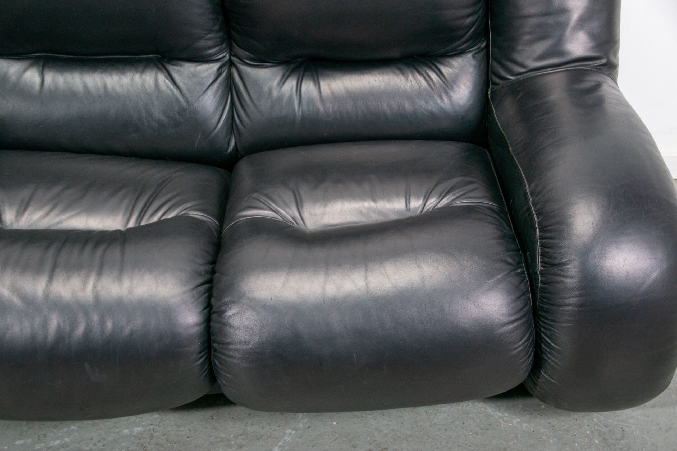 Black leather space age Italian 2 seater sofa