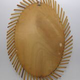 Mirror rattan oval radiating around 1960  - 37x50cm