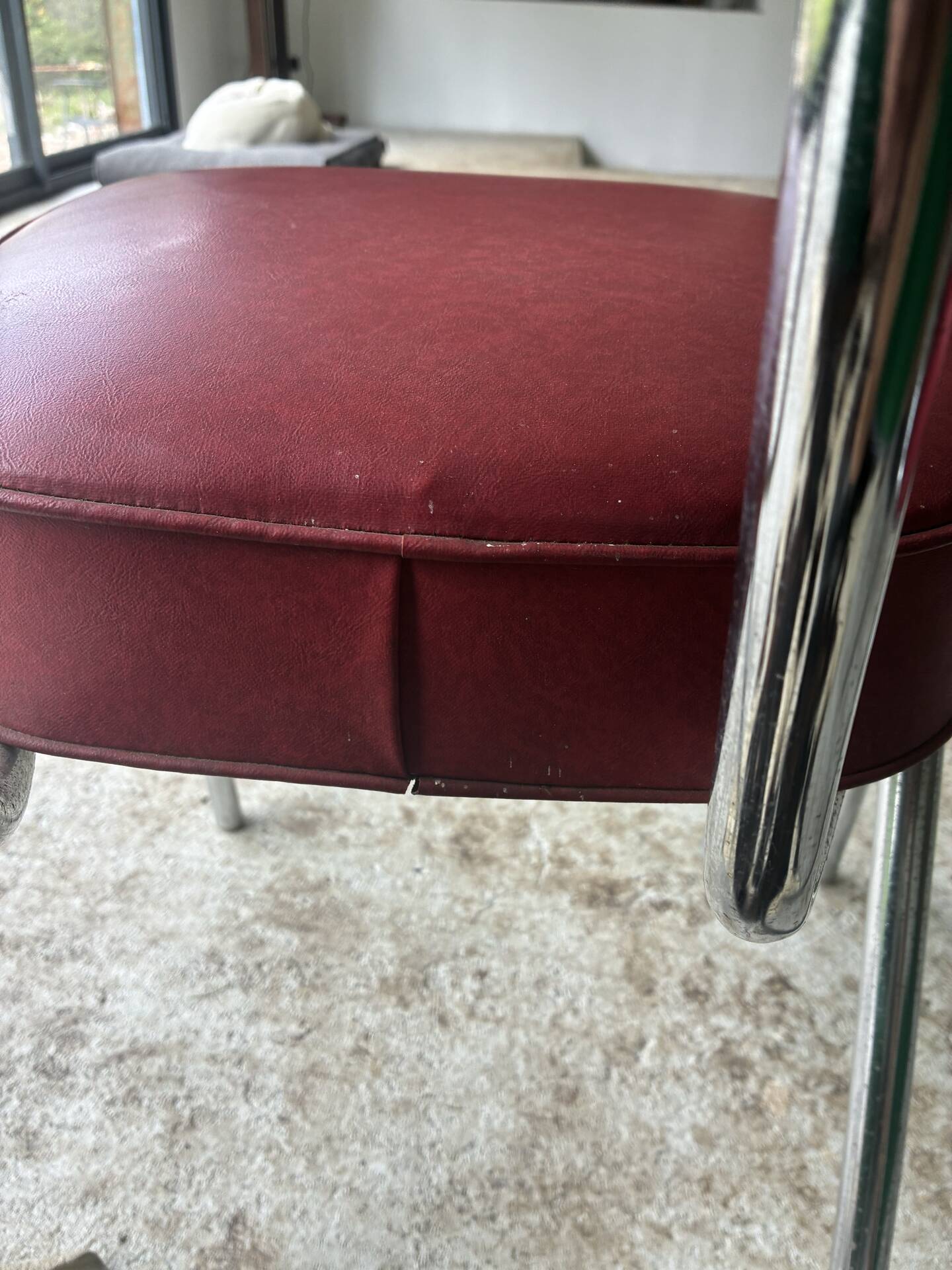 2 vintage red faux leather chairs