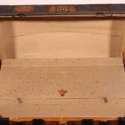 travel trunk from the early 20th century made of leather and wood