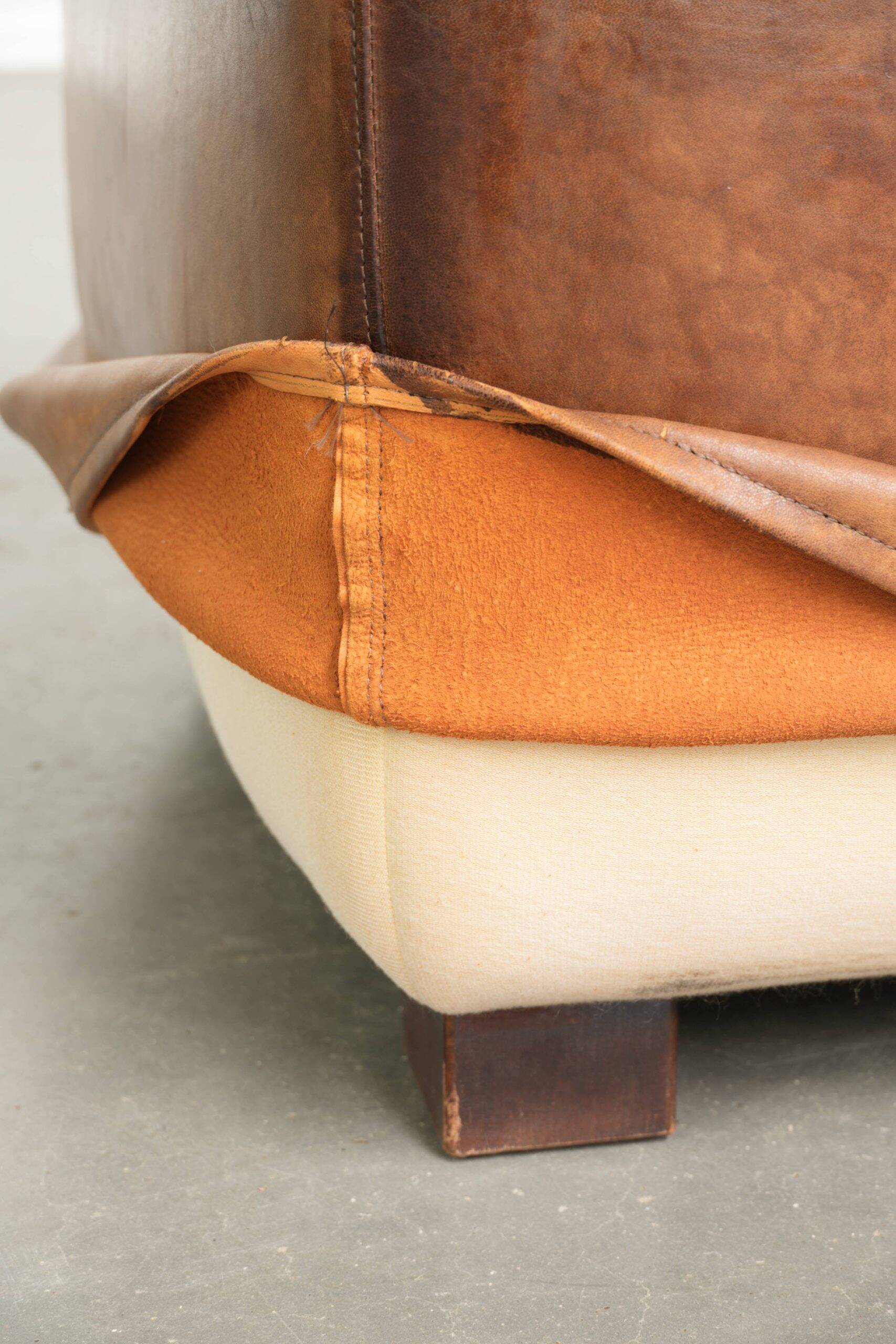 Sheepskin design ottoman with a very beautiful patina and stunning colours
