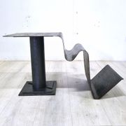 Curved sheet metal side table with magazine stand, 1980s