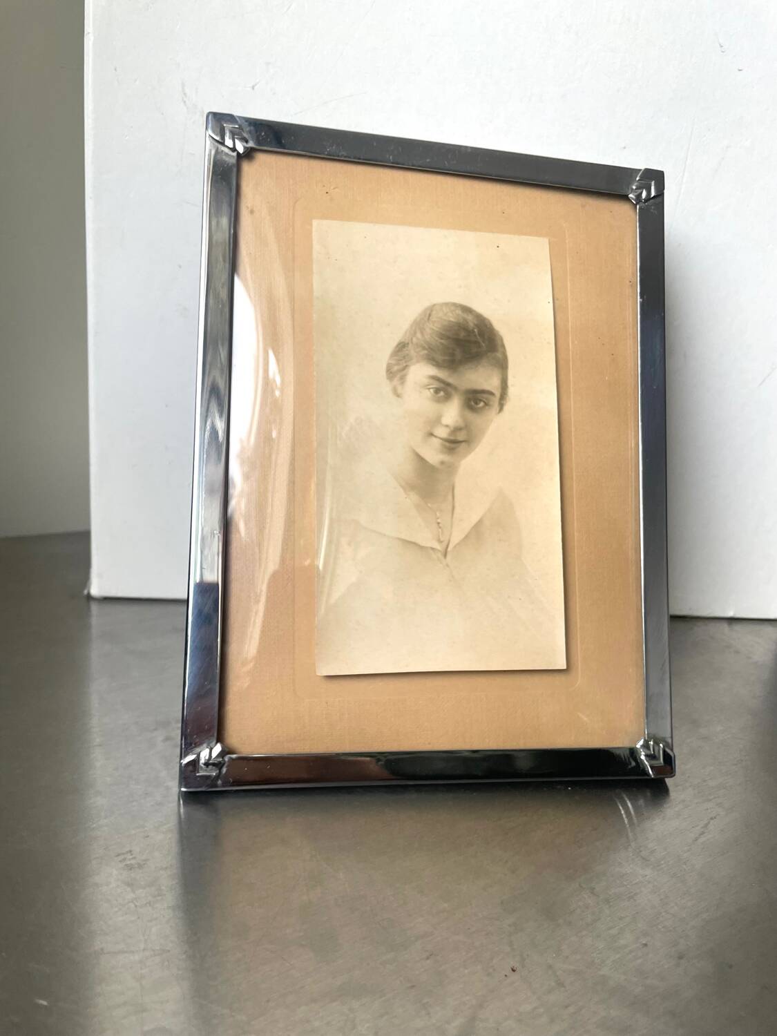 Art deco silver colored  metal frame  20.5  cm x 15.5 cm convex glass