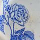 2 flat plates mismatched iron earth with blue flower motifs France