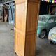 Wardrobe / Solid wood storage unit with one door.