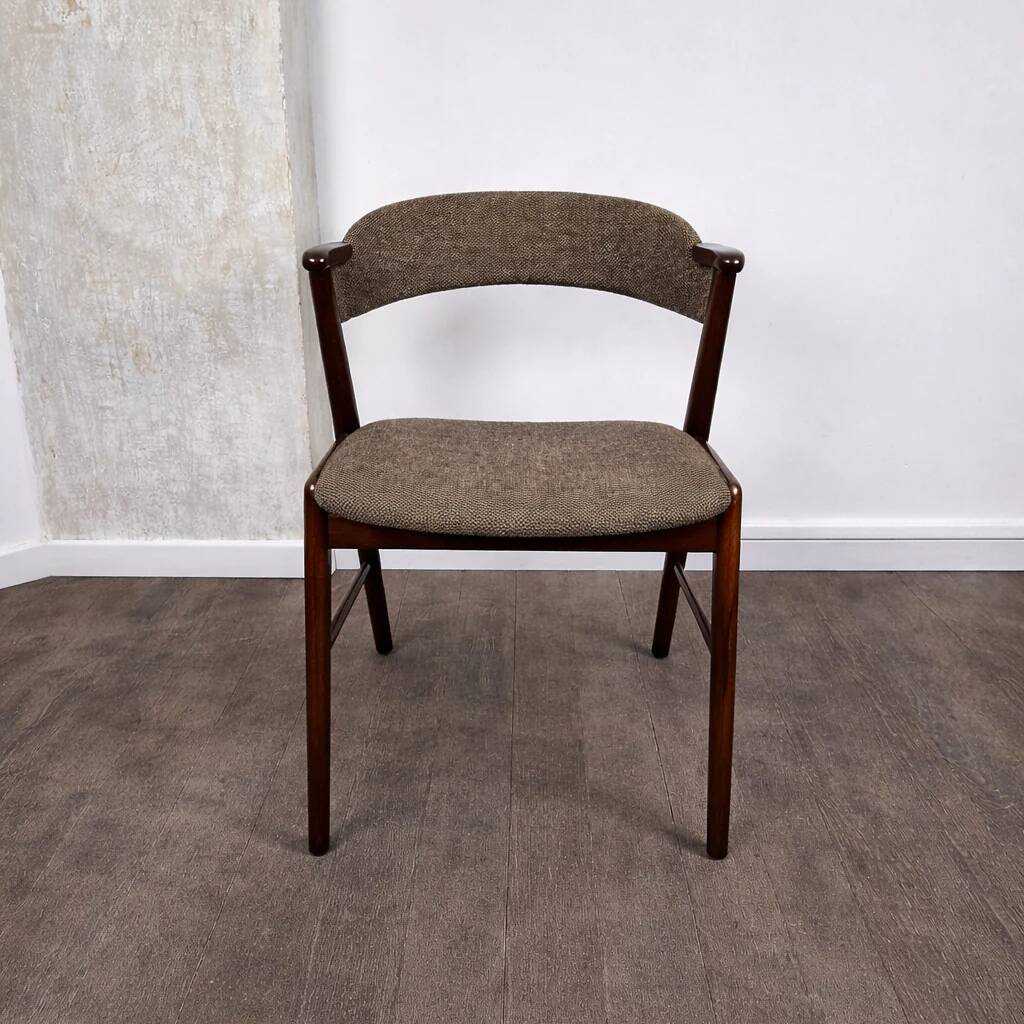 Rosewood and wool chair, model 32 by Kai Kristiansen for Korup Stolefabrik, Denmark, 1960.