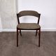 Rosewood and wool chair, model 32 by Kai Kristiansen for Korup Stolefabrik, Denmark, 1960.