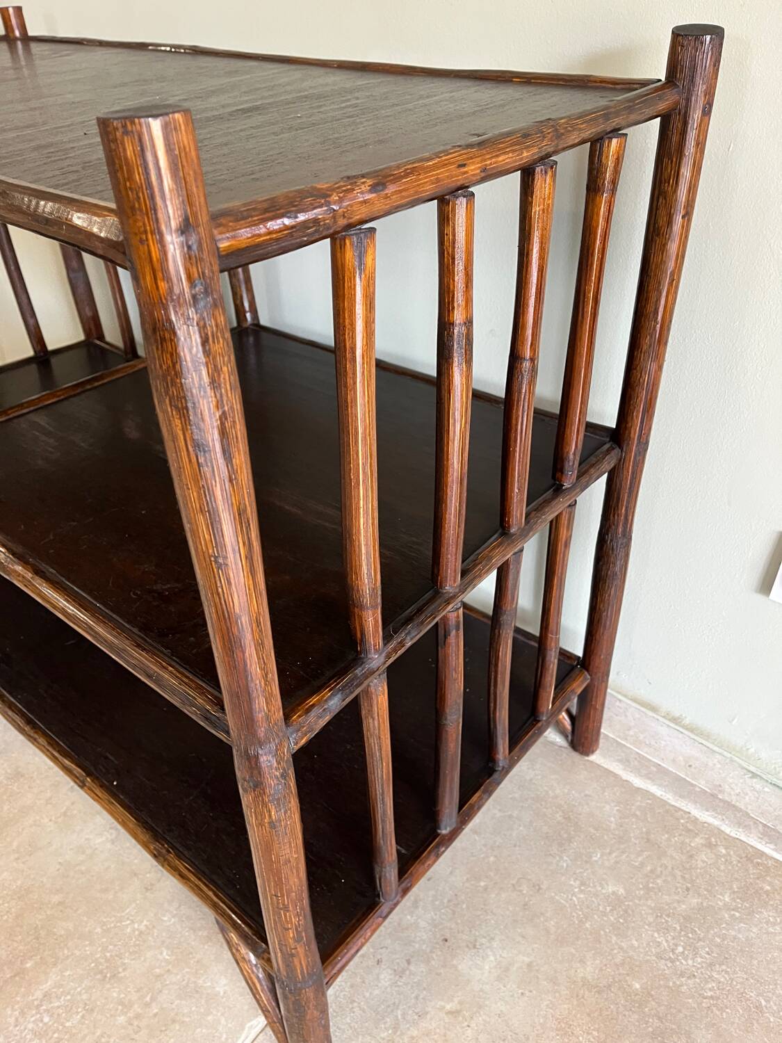 Brown rattan console shelf