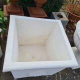Contemporary reconstituted stone pot for the garden