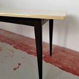Vanilla-coloured formica table