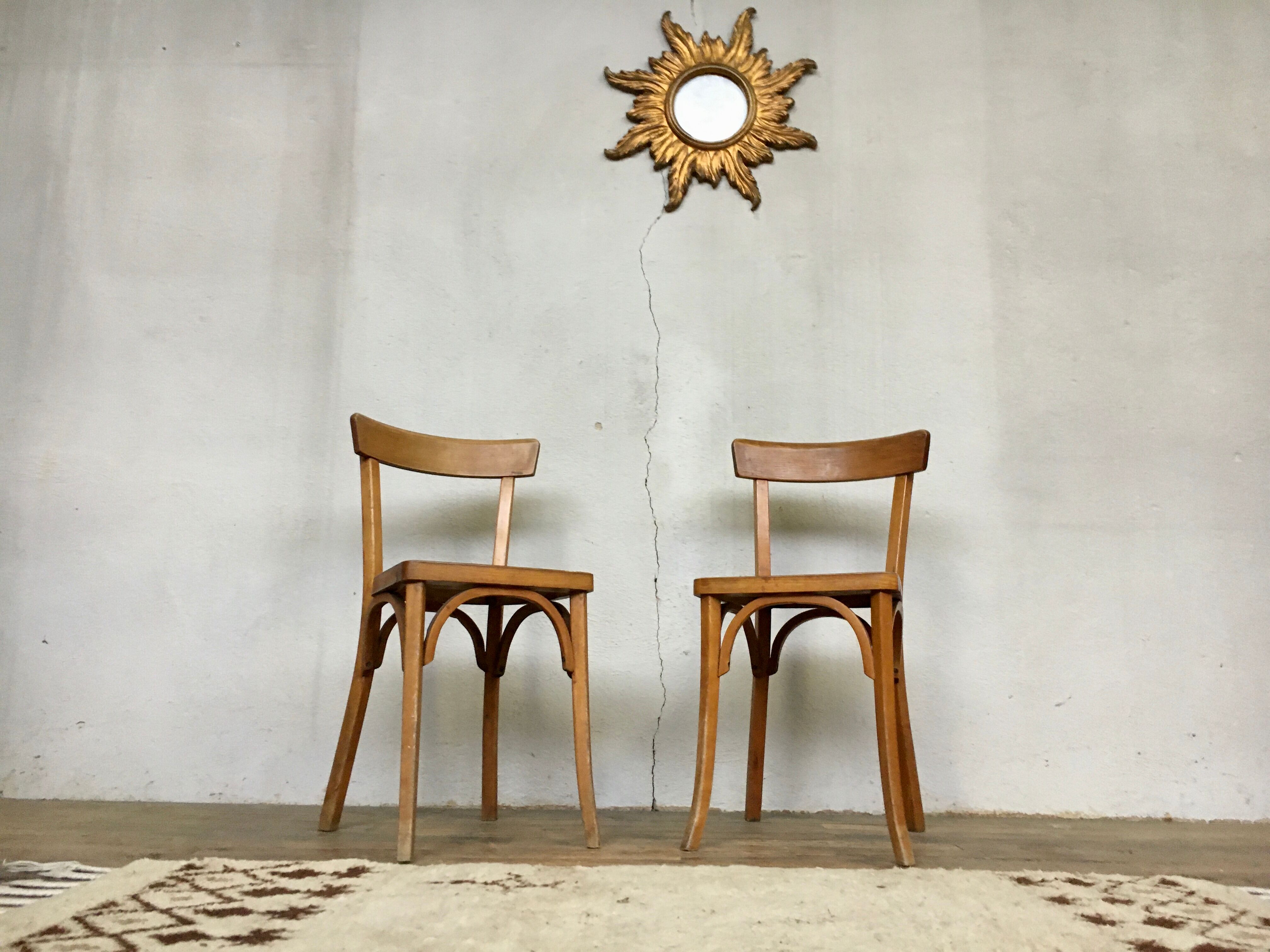 Pair of vintage clear beech baumann chair