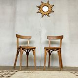 Pair of vintage clear beech baumann chair