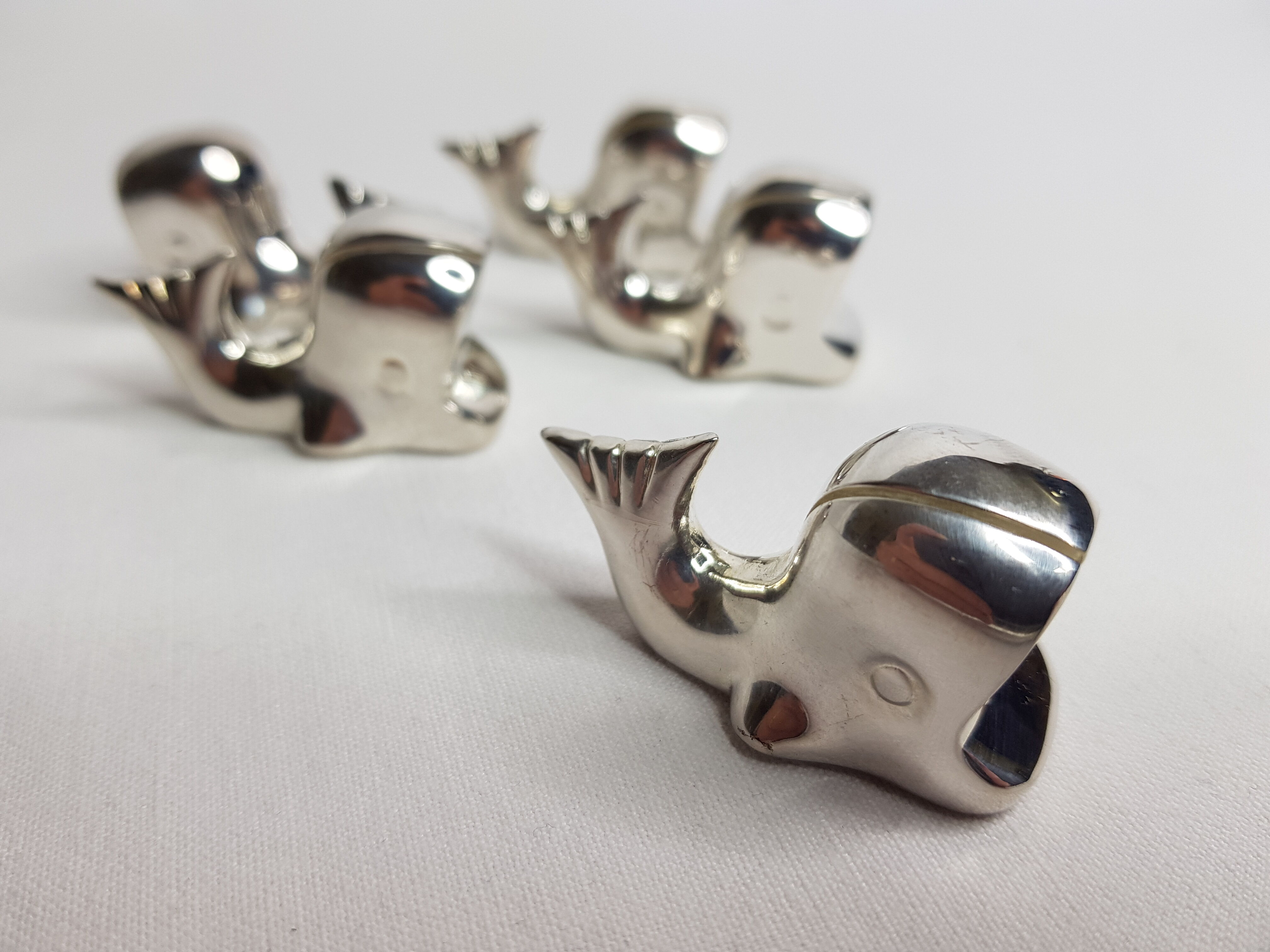 Set of 5 named "whales" in silver metal