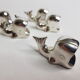 Set of 5 named "whales" in silver metal