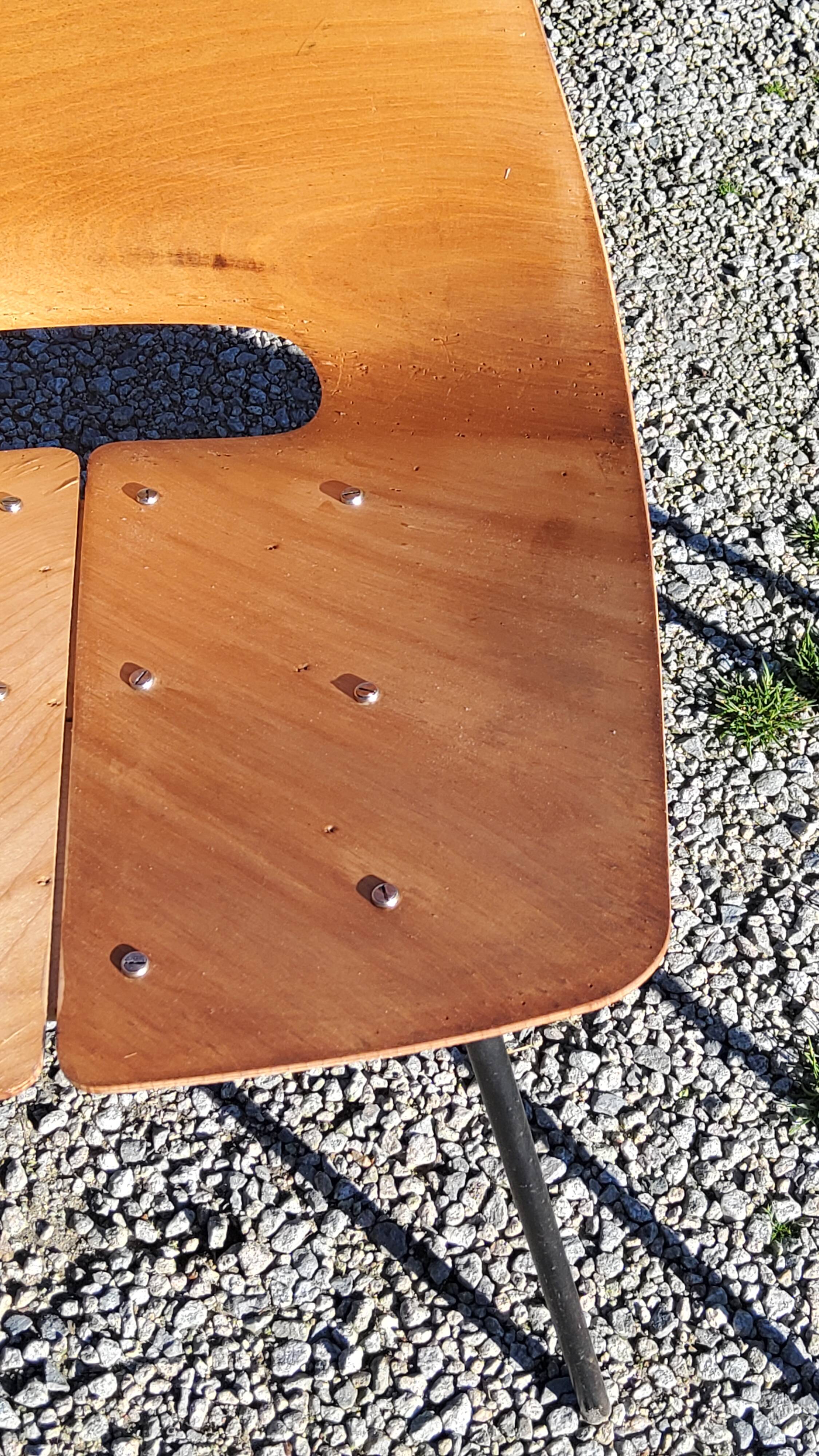 Pair of tonneau chairs by Pierre Guariche plywood base tubes 1954