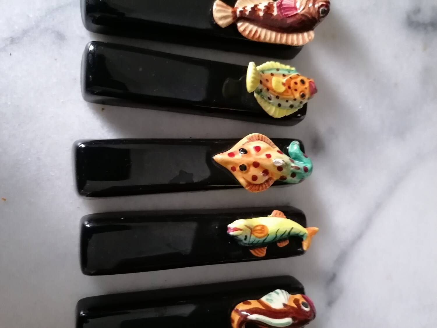 Vintage fish slip knife holders