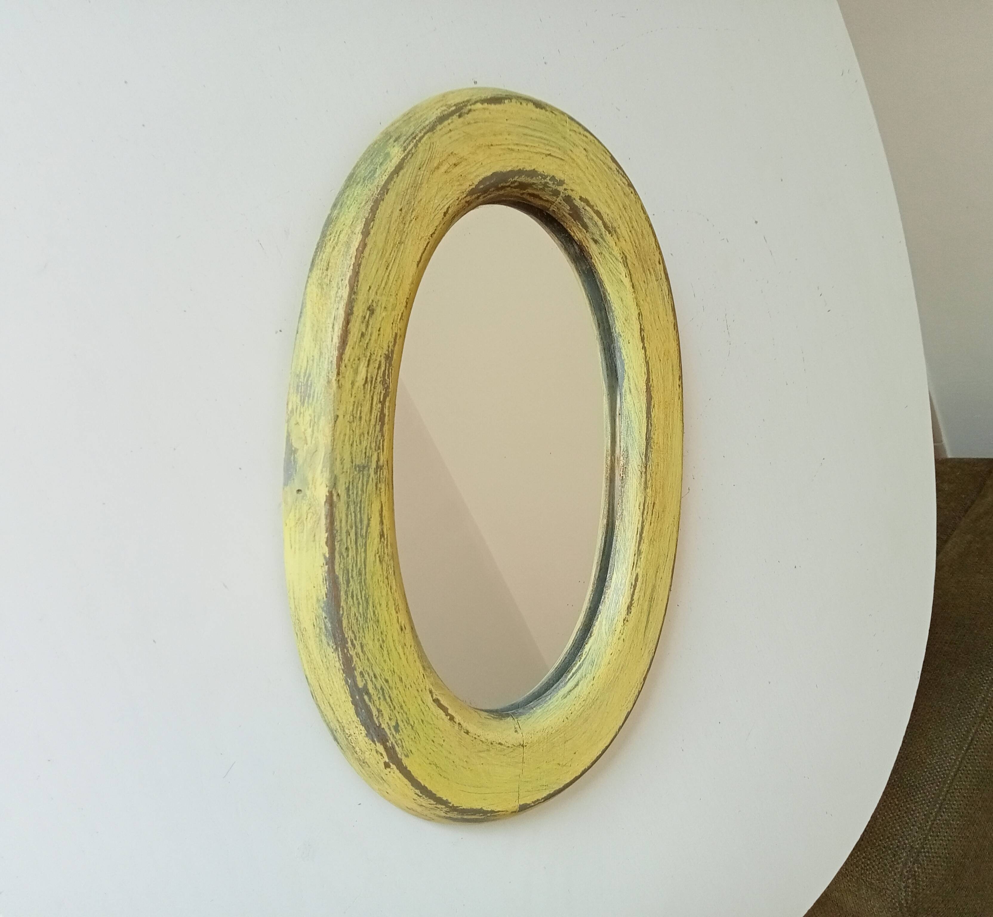 Small antique oval mirror