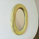 Small antique oval mirror