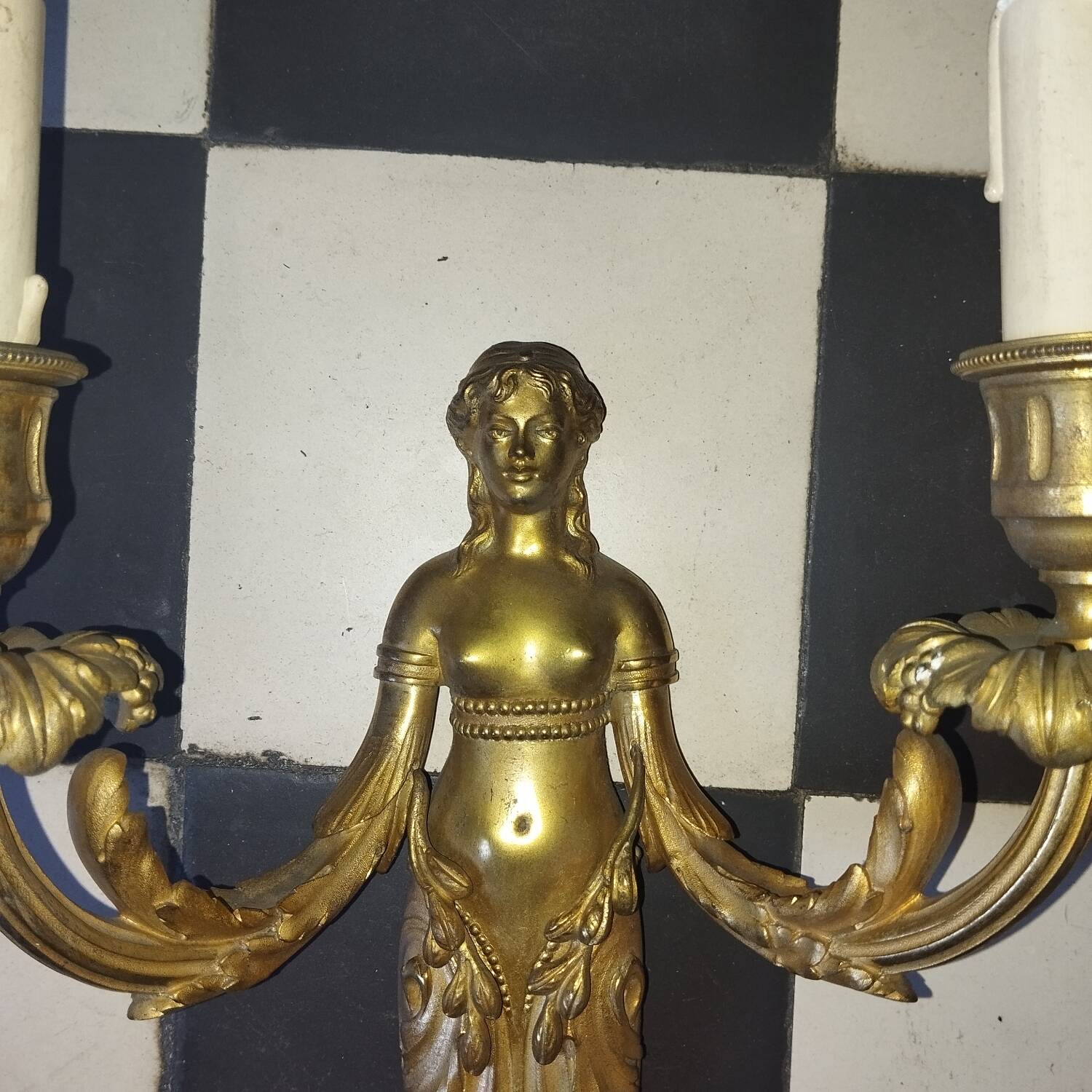 Paire d'appliques cariatides bronze doré