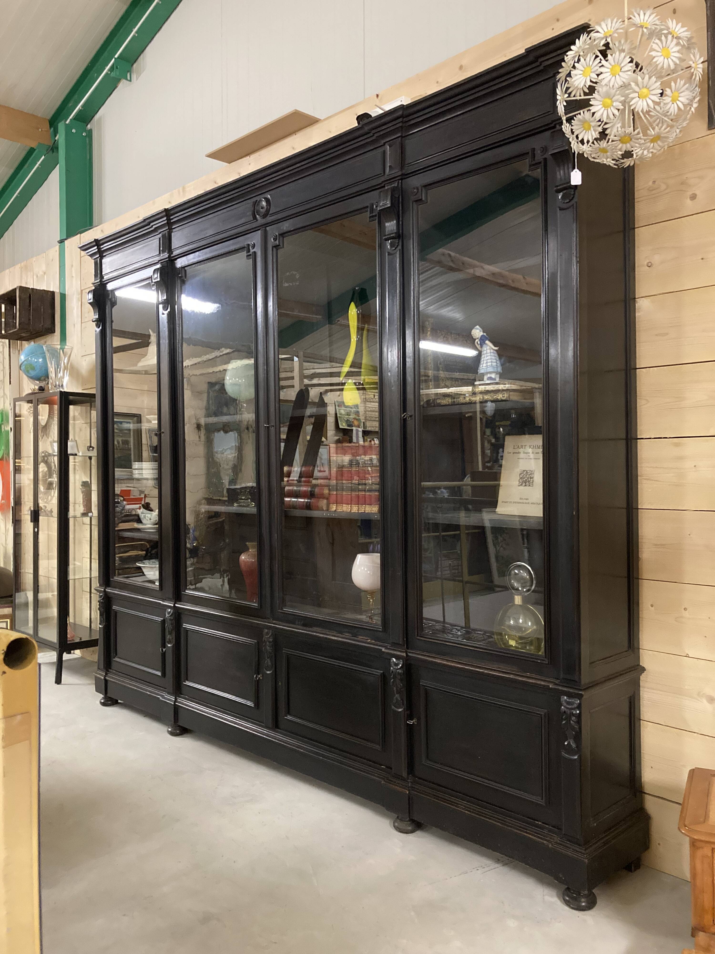 Library from the Napoléon III era in blackened pear wood.