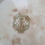 Trivet and Longwy enamel bottle