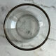 Glass and silver-plated metal salad bowl, silver rim.