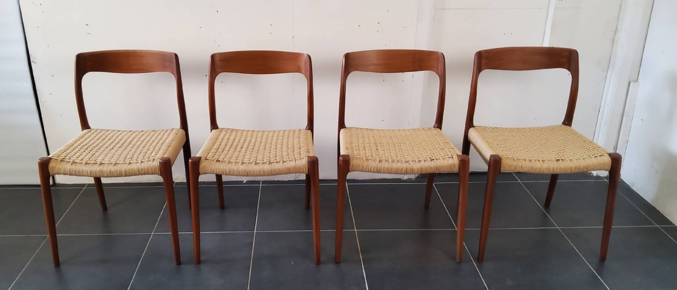 Danish dining chairs in wood and paper cord