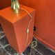Brass shell socket lamp from the 1st WW, black pyramidal lampshade in Carlucci linen.