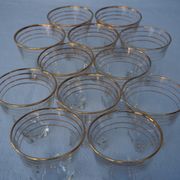 Golden liqueur service from the 1950s-1960s and its 12 glasses.