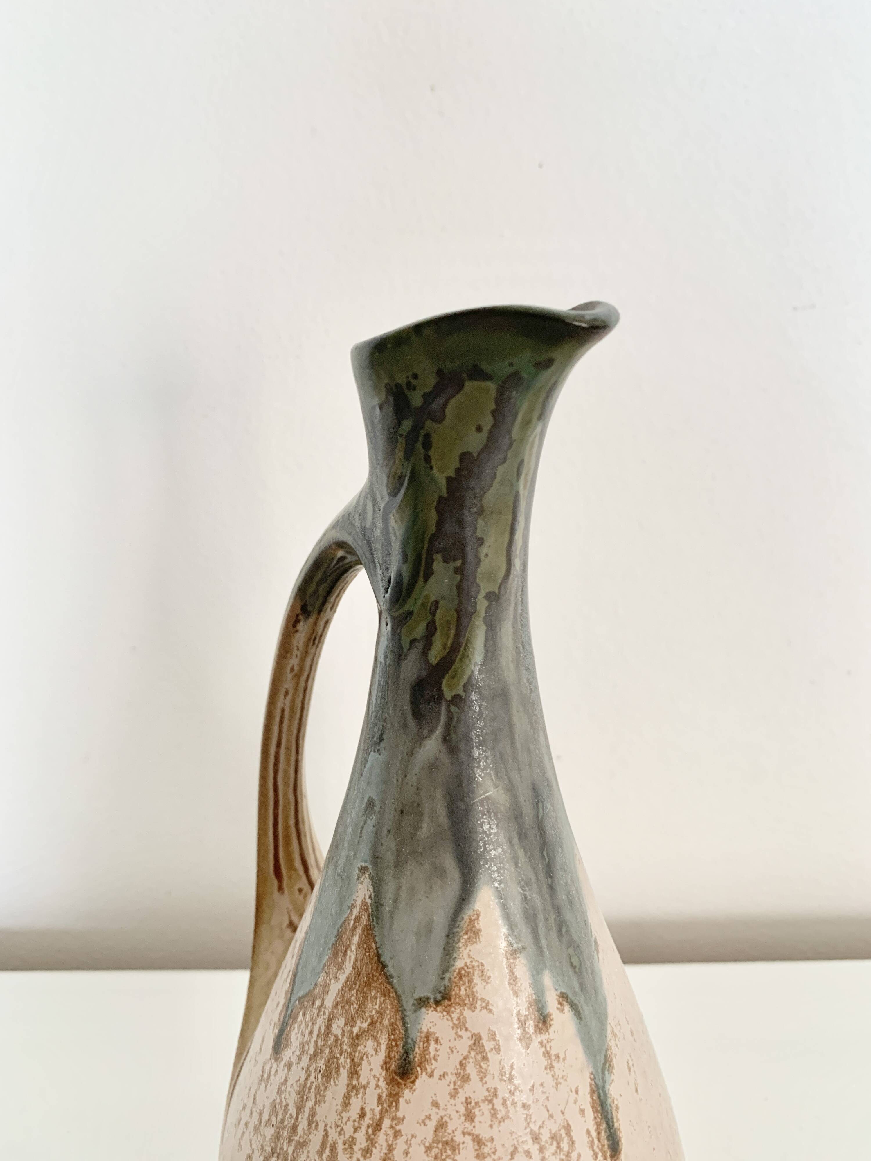 Stoneware jug signed Denbac