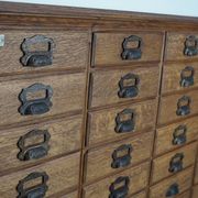 Antique French oak filing / apothecary cabinet by Chouanard, ca 1910