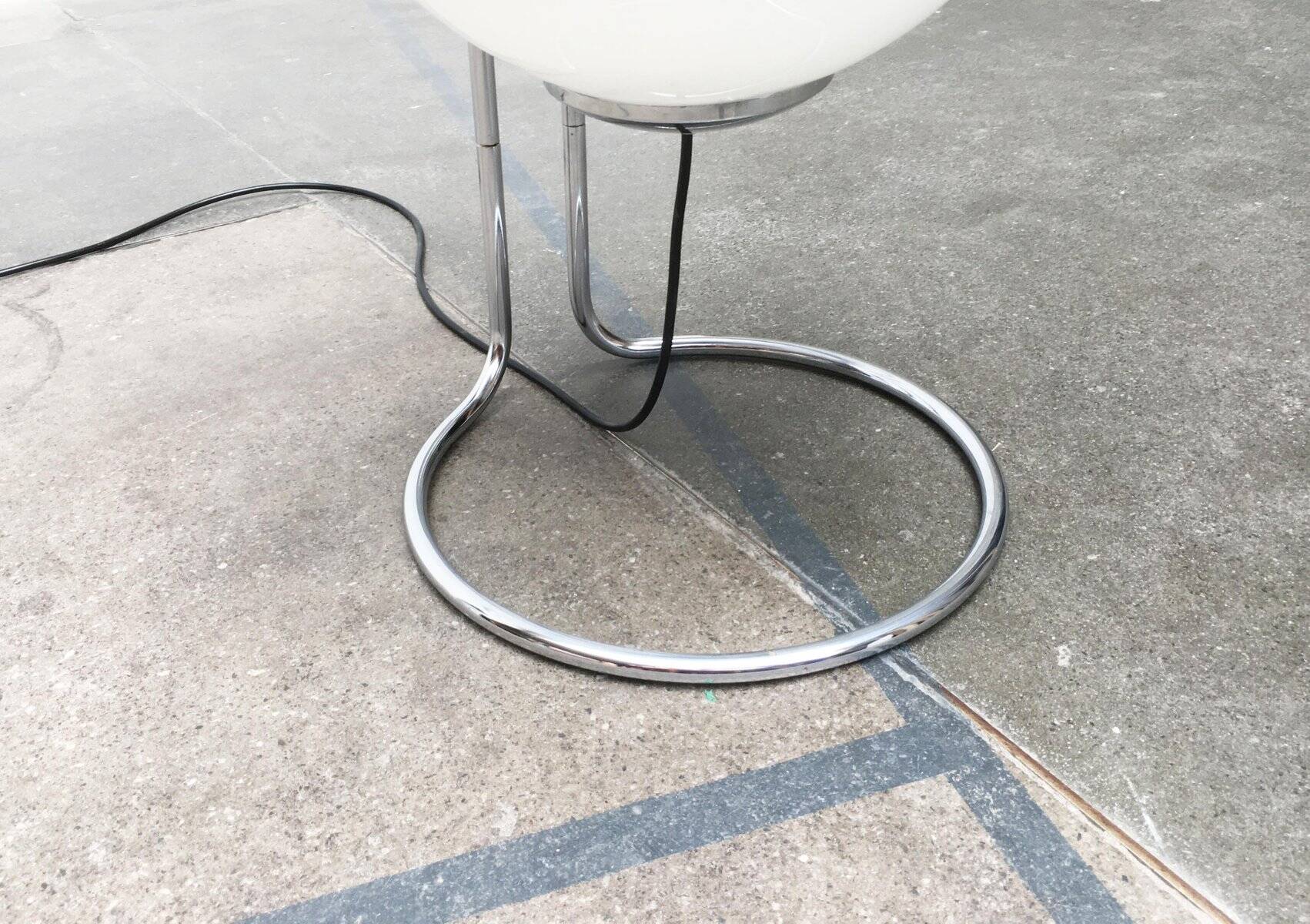 Vintage globe floor lamp in glass and chrome from the space age.