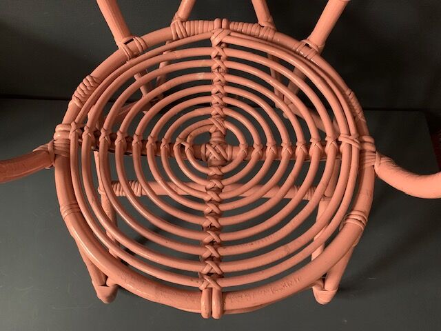 Vintage pink rattan armchair