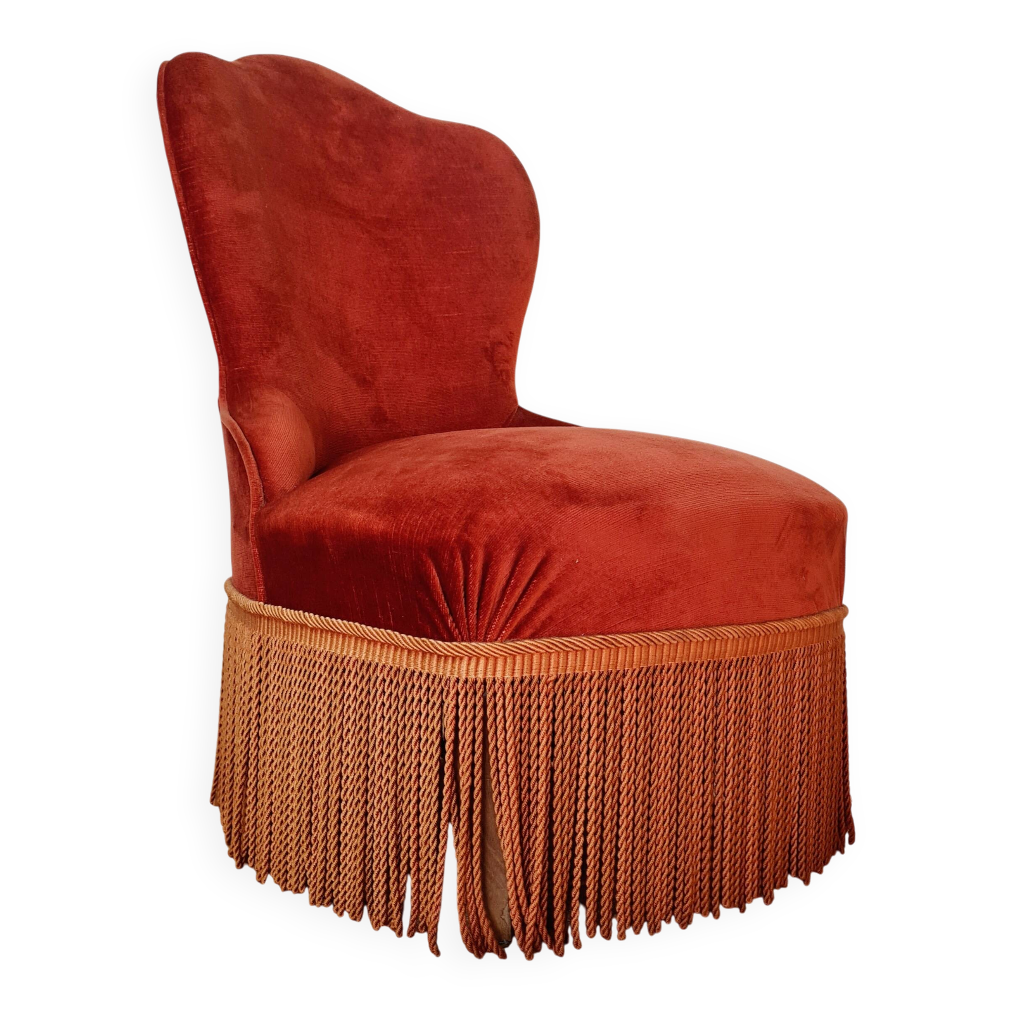 Red velvet toad armchair with fringes