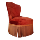Red velvet toad armchair with fringes