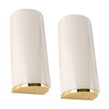 Pair of large opaline glass wall lights in brass designed by Limburg, Germany.