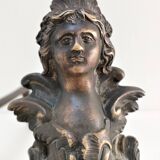 Pair of bronze andirons with black patina, 19th century, female caryatids