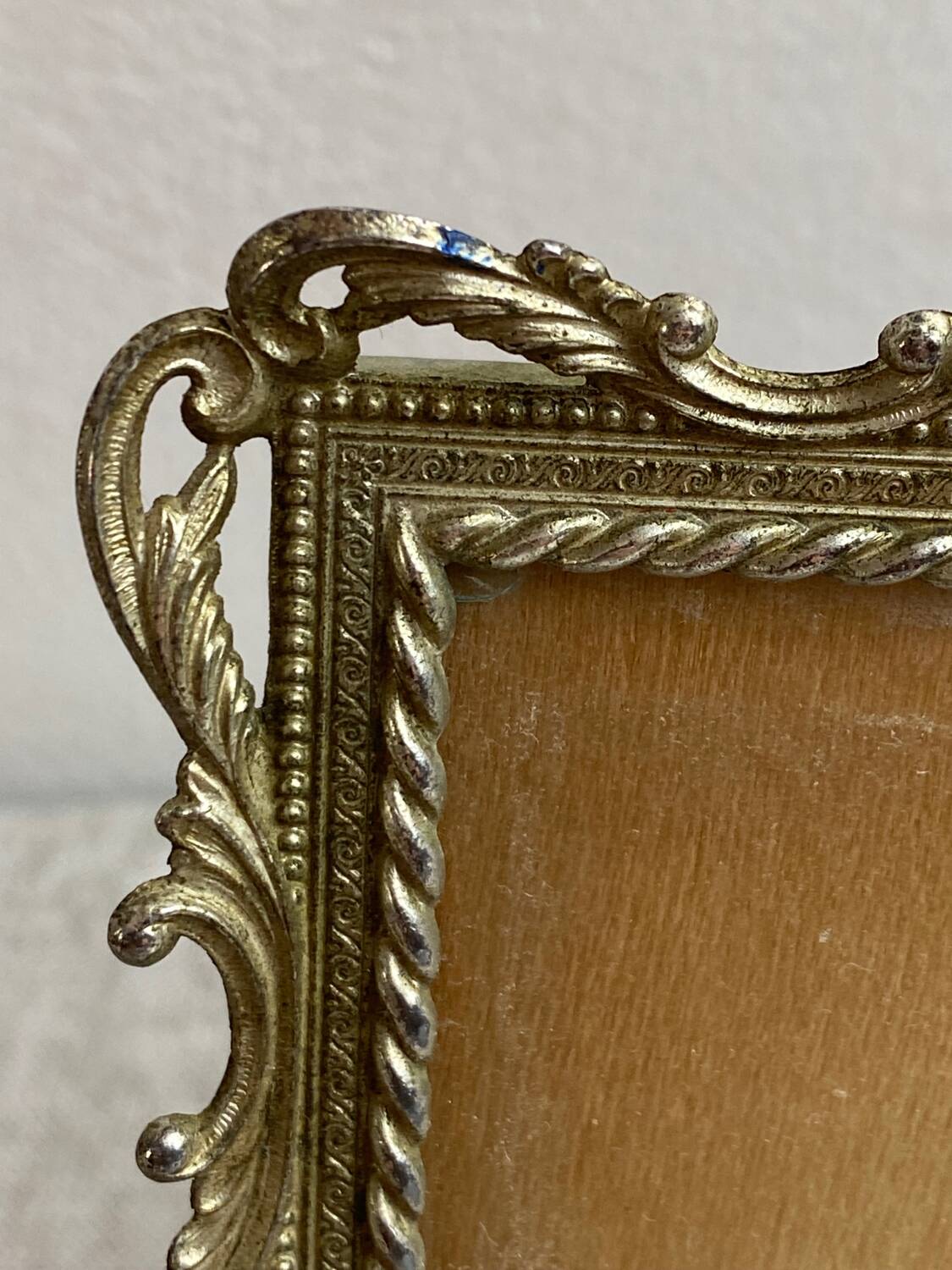Italian gold metal frame on stand